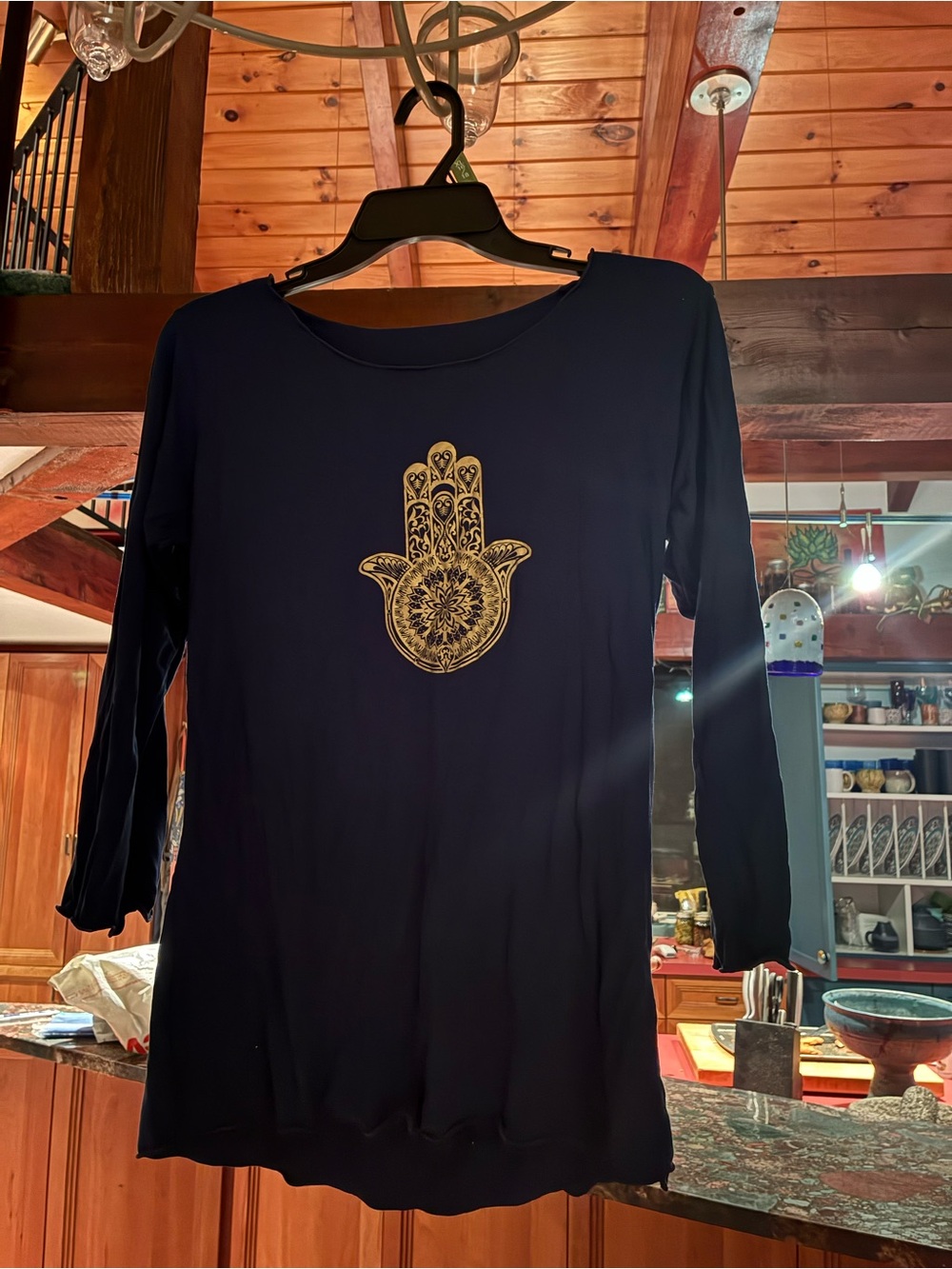 Women's Black Long-Sleeve Top with Gold Hamsa Print